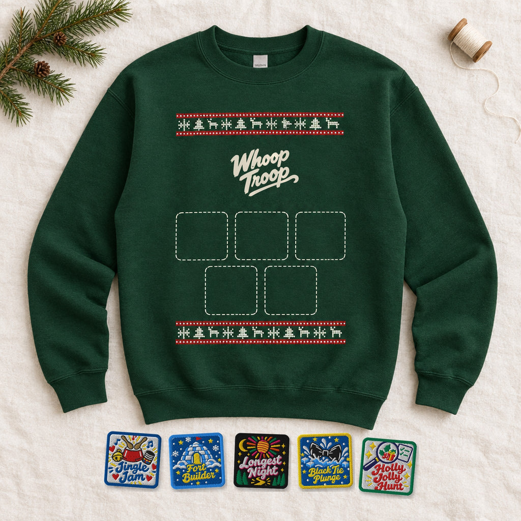 Holiday Drop Gift Set: forest green Holiday Drop knit sweatshirt laid flat with all five Holiday Drop challenge badges