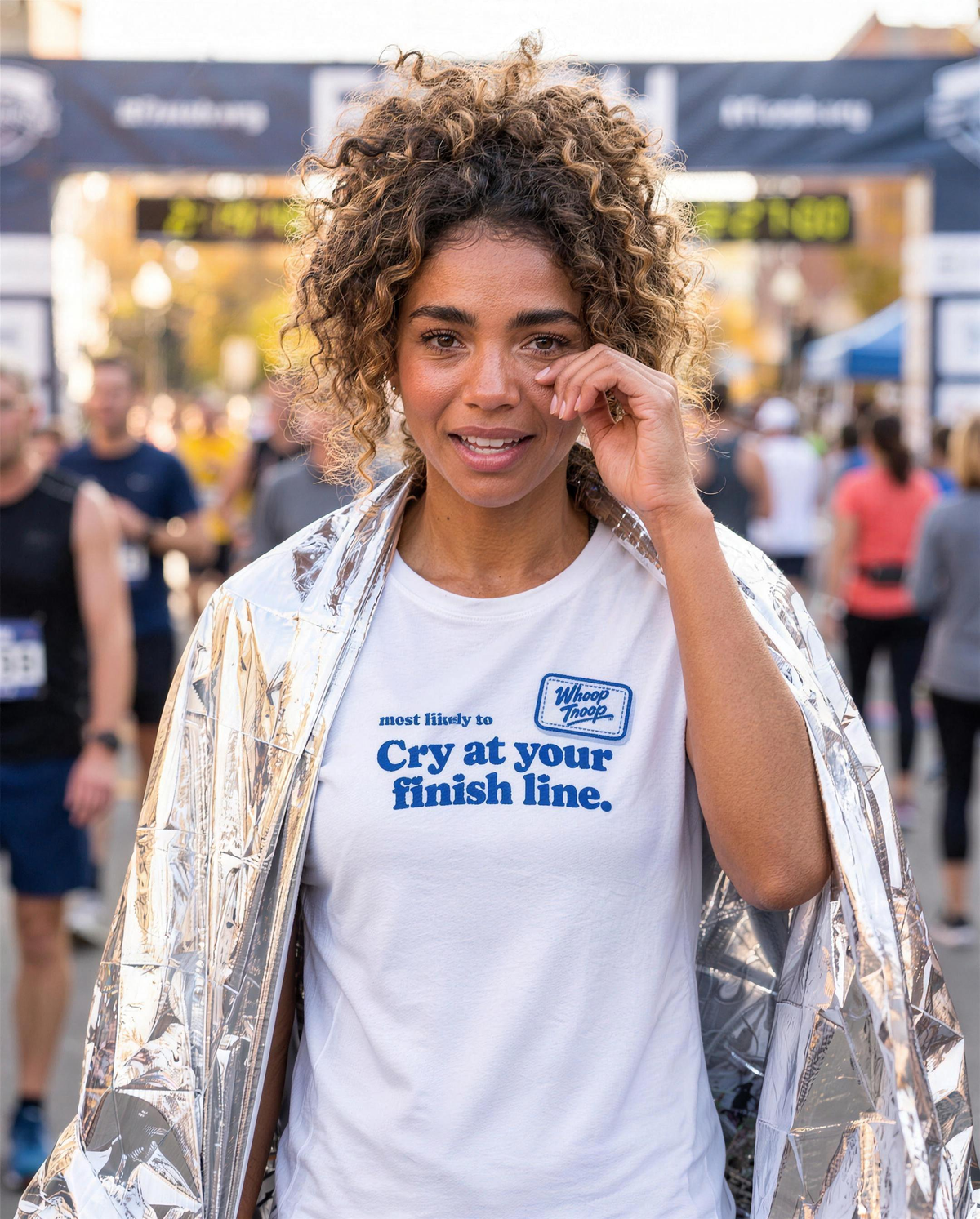 Most Likely To: Cry at Your Finish Line Tee (Light), lifestyle photo (AI-generated model)