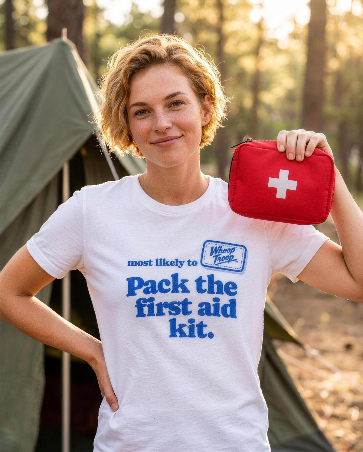 Most Likely To: Pack the First Aid Kit Tee (Light), lifestyle photo (AI-generated model)