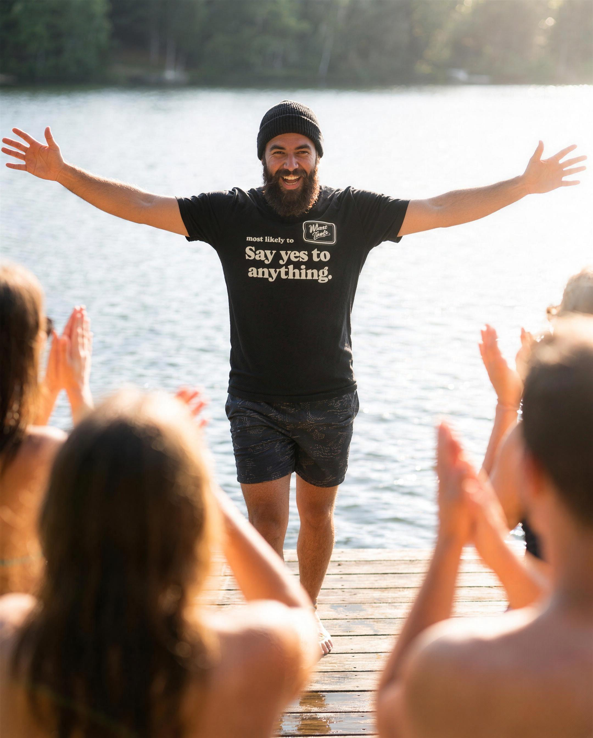 Most Likely To: Say Yes to Anything Tee (Dark), lifestyle photo (AI-generated model)